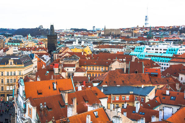 Prague / Czech - January 3 2018: Panorama of the city of Prague. The old part of the city. Beautiful roofs of shingles. Ancient buildings and churches. - Foto, Bild