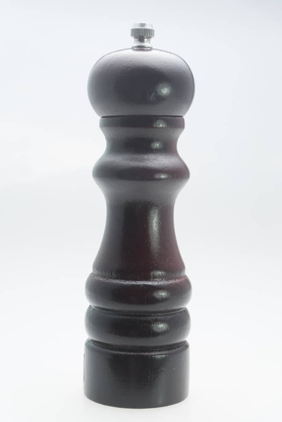 black peppermill on white background - Foto, afbeelding
