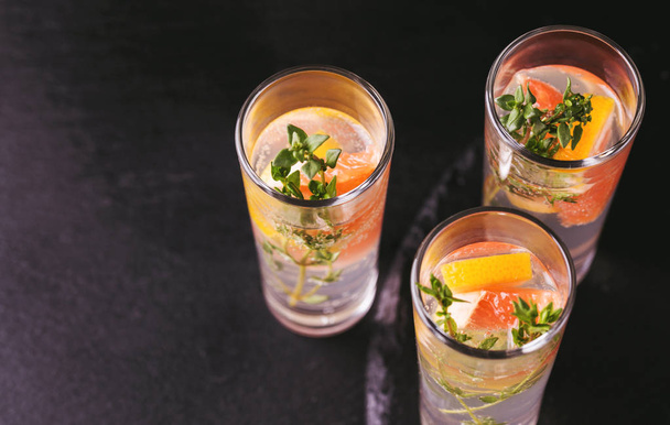 Gin bitter lemon with thyme and grapefruit.  - Photo, image
