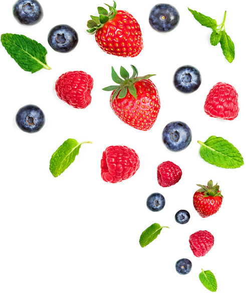 fresh berries pattern with mint leaves on white background  - 写真・画像