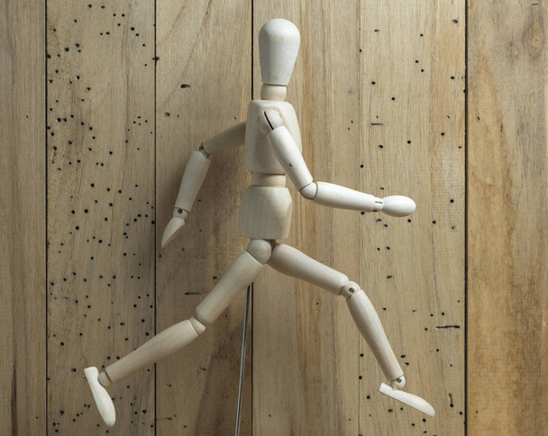 wooden man model on wooden background  - Foto, Imagem
