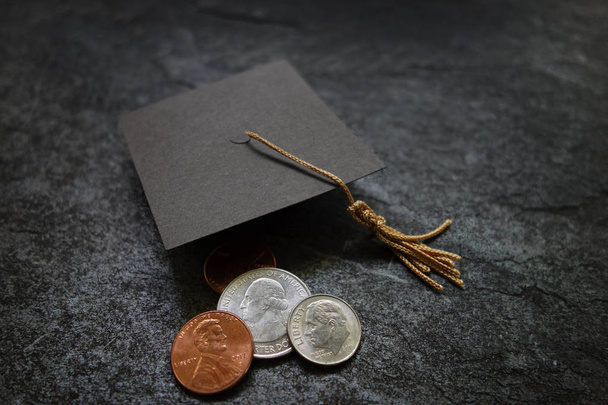 Graduation cap and coins - Foto, Imagen