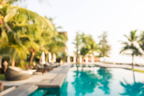 Abstracto desenfoque piscina al aire libre con palmera de coco
 - Foto, Imagen