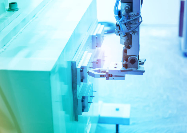 Robotic hand machine tool in industriële vervaardiging fabriek - Foto, afbeelding