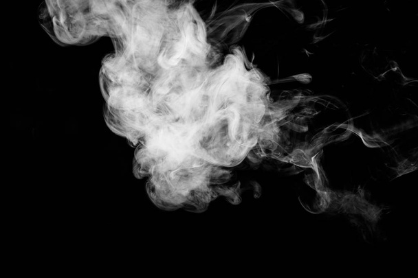 white smoke on a black isolated  - Foto, Bild