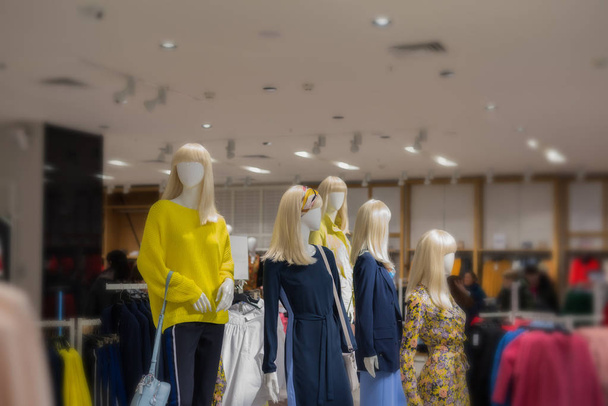 Five mannequins standing in store display of womens casual clothing - Photo, Image