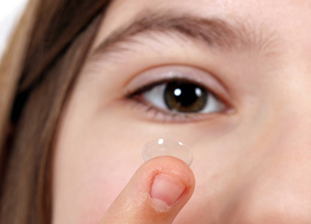 contact lens for vision and girl face closeup - Photo, Image