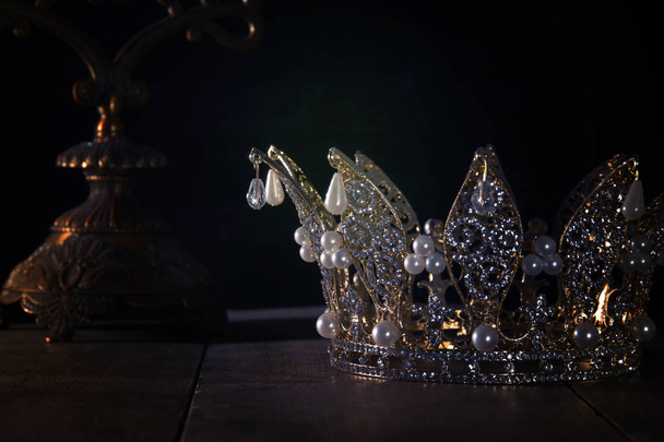 low key image of beautiful queen/king crown. fantasy medieval period. Selective focus. - Foto, Imagem