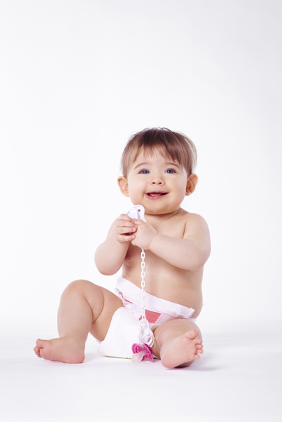 Портрет веселого младенца в подгузнике
 - Фото, изображение