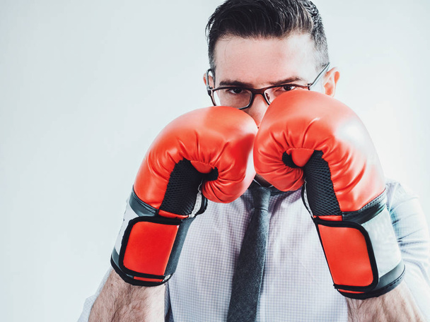 Businessman and red boxing gloves - Foto, Bild
