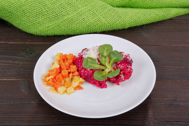 Risotto with red beet on a table - Φωτογραφία, εικόνα
