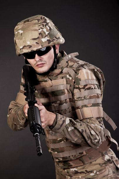 Modern soldier with rifle - Фото, зображення