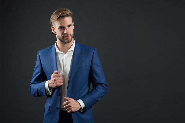 Man in blue suit jacket and shirt. Businessman with bearded face and stylish hair. Manager in formal outfit. Fashion, style and dress code. Business, entrepreneurship and career concept, copy space - Foto, Imagen