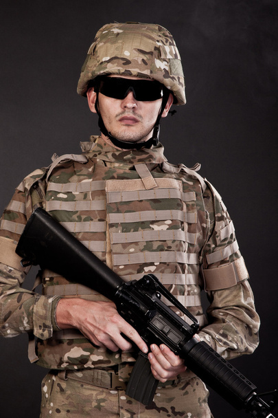 Modern soldier with rifle - Foto, Imagen