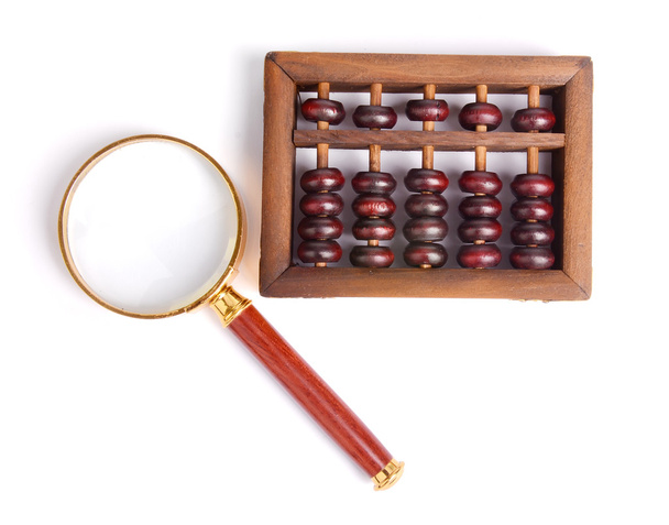 Китайський abacus і збільшувальним склом, концепція бізнесу - Фото, зображення