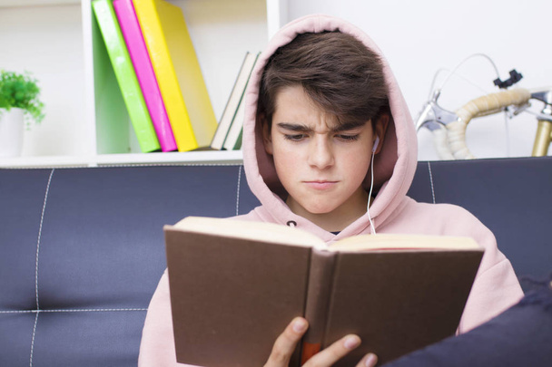 adolescent or preteen student with the textbook at home - Photo, Image