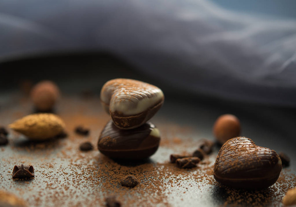 chocolate hearts with nuts darkphoto - Photo, Image