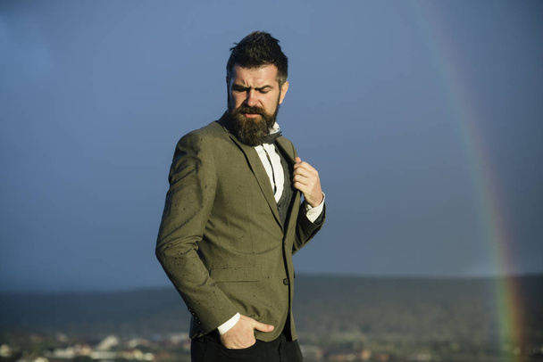Man with beard and mustache and scenery with rainbow - Fotoğraf, Görsel