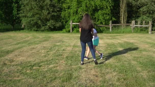 Down syndrome girl have fun outside - Felvétel, videó