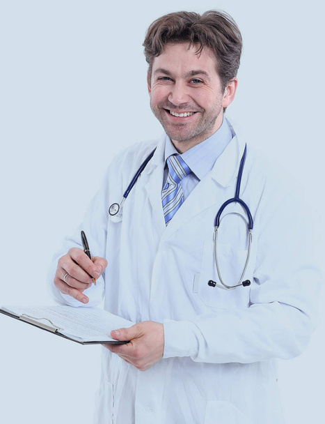 portrait of a smiling doctor . - Фото, зображення