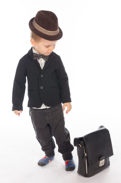 Portrait of beautiful child with hat and bag - Foto, Bild