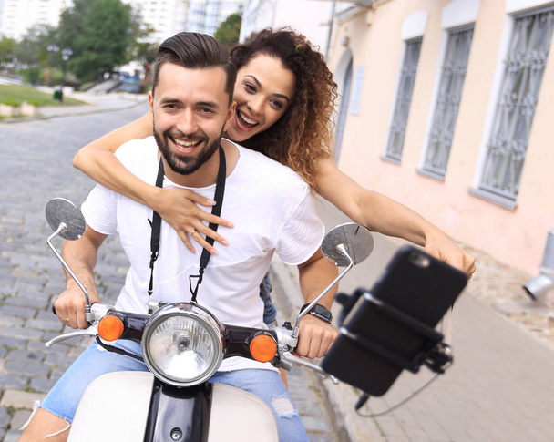Happy couple traveling on motorcycle.Travel concept - Photo, Image