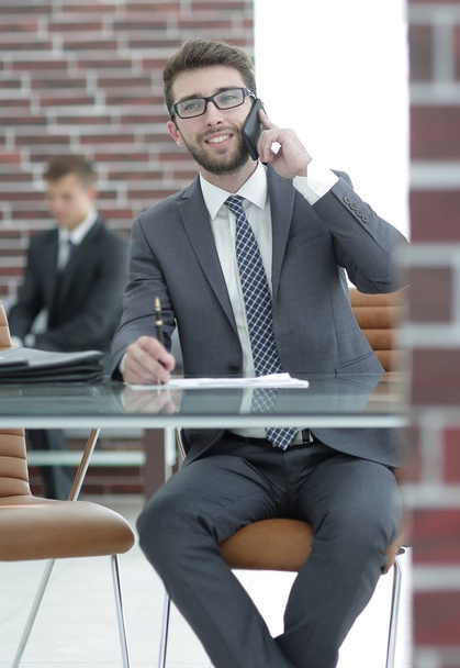 financial Manager sitting at his working place - Foto, Bild