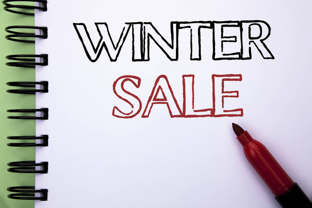 Handwriting text Winter Sale. Concept meaning Promotion Offer Shop Discount Season Offers Auction Deal Objective written on Notebook Book on the plain background Marker next to it. - Photo, Image