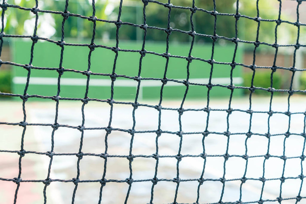 net with empty tennis court background - Photo, Image