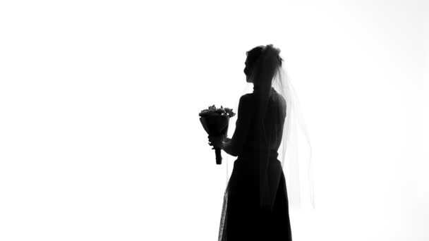 Bride shadow throwing back bouquet on wedding day, marriage ceremony, traditions - Πλάνα, βίντεο