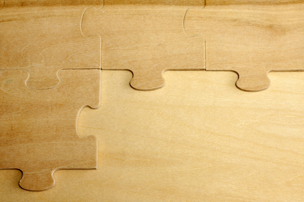 Puzzle su tavole di legno concetto di sfondo astratto
 - Foto, immagini