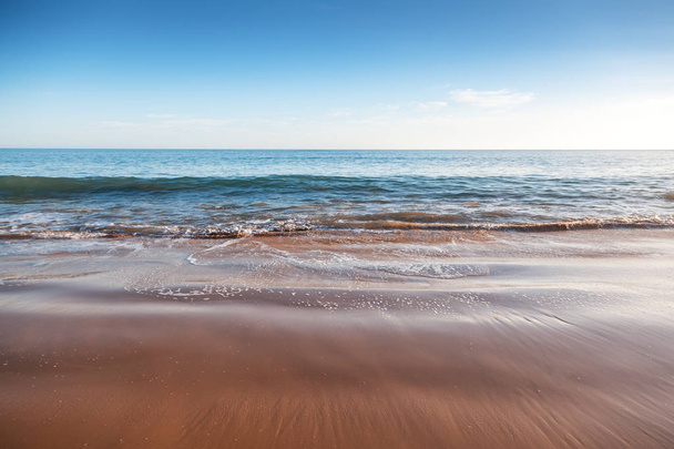 ocean coast, sand beach and foamy waves, beautiful natural vacat - Zdjęcie, obraz