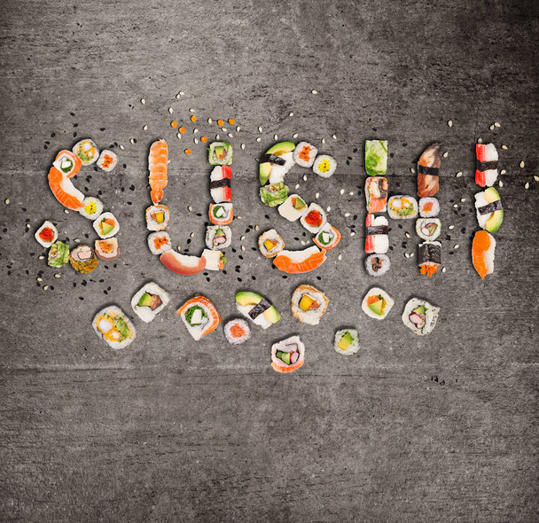 Hagyományos japán sushi darabok felirattal. - Fotó, kép
