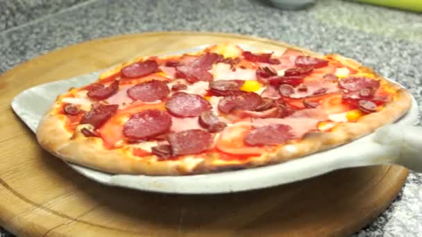 Meat pizza on wooden board. - Footage, Video