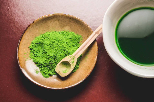 Close up of Matcha tea and powdered green. - Foto, afbeelding