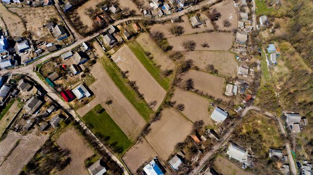 Top view of typical village in the early spring. Aerial view. - Photo, Image