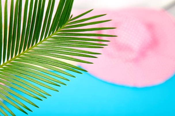 Summer outfit blurred. tropical palm leave - Photo, Image