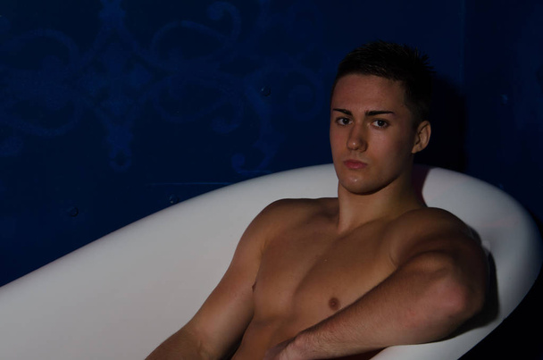 Sexy attractive man in bath. Relax and freshness. - 写真・画像