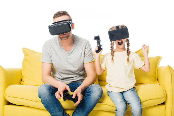 family in virtual reality headsets with joysticks playing video games isolated on white - Photo, Image