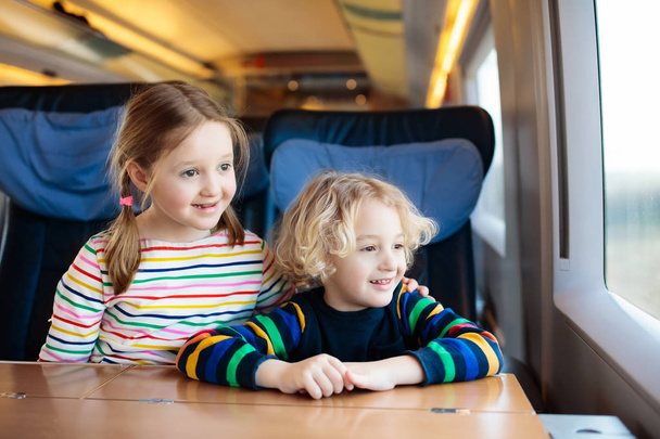 Kids travel by train. Railway trip with child. - Foto, Imagem