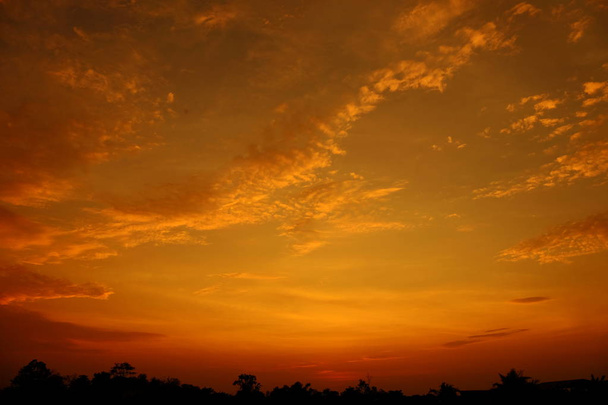 Beautiful cloudy sunset sky.Beautiful cloudy sunset at sea. - Photo, Image
