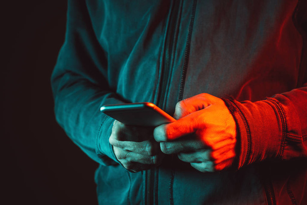 Smartphone in male hands, close up - Фото, зображення