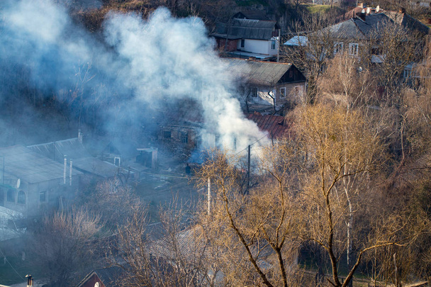 Fire with black smoke in house. House in smoke - Photo, Image