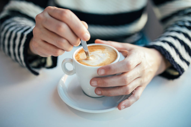cup of coffee and hand - Φωτογραφία, εικόνα