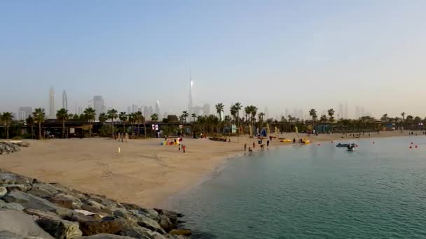 Jumeirah Public Beach, skyscrapers in the background. Dubai, UAE - Footage, Video