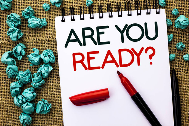 Writing note showing  Are You Ready Question. Business photo showcasing Be Prepared Motivated Warned Readiness Aware written on Notebook Book on the jute background Markers next to it. - Photo, Image