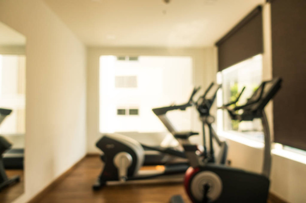 Abstract blur and defocus fitness equipment and gym interior - Photo, Image