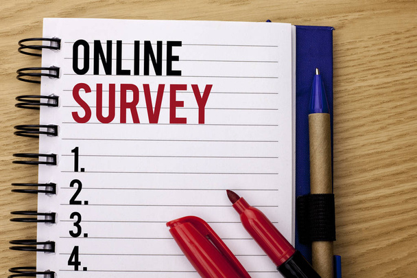 Handwriting text writing Online Survey. Concept meaning Digital Media Poll Customer Feedback Opinions Questionnaire written on Notebook Book on the wooden background Marker and Pencil next to it. - Photo, Image