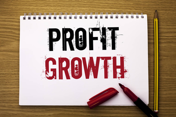 Írása Profit növekedést mutató Megjegyzés. Üzleti fénykép bemutató pénzügyi siker nőtt bevételek alakulása fejlesztési írt Notebook könyv a fából készült háttér Marker és a ceruza. - Fotó, kép