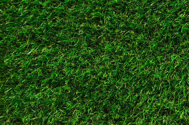 Green grass background. Artificial lawn. - Foto, immagini